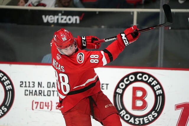 Martin Necas of the Carolina Hurricanes shooting the puck